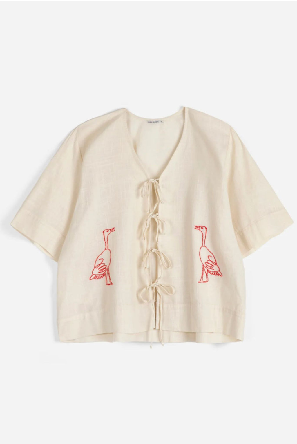 Blusa anudada con bordado